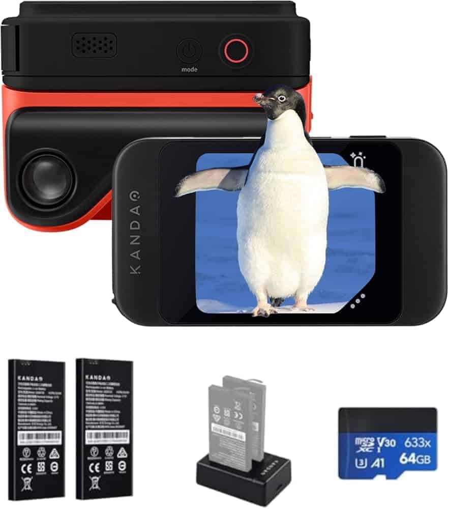 Penguin caught on smartphone screen with bird behind, digital camera, batteries, SD card, and portable charger displayed.