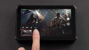 Webcam being filmed on a mobile device for AV solutions.