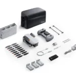 Portable drone with multiple propellers and accessories for professional aerial photography.