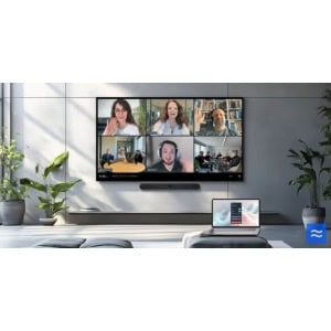 Webcam and video conferencing equipment in a modern meeting room.